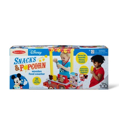  Melissa & Doug Disney Snacks & Popcorn Wooden Pretend Play Food Counter – 33pc